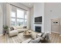 Spacious living room boasts a large fireplace and abundant natural light at 1098 Gatewick Ct, Greenwood, IN 46143