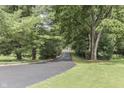 Curving driveway through lush landscaping at 7601 S 700 W, Morgantown, IN 46160