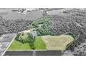 Aerial view showing home, pond, and property boundaries at 7601 S 700 W, Morgantown, IN 46160
