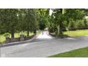 Long driveway leading to home with gated entrance at 7601 S 700 W, Morgantown, IN 46160