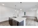 Modern kitchen with island and stainless steel appliances at 1058 Bevy Blvd, Danville, IN 46122