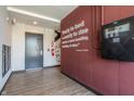 Building hallway with fire safety equipment and inspirational quote at 150 S Main St # 201, Franklin, IN 46131