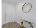 Bright entryway with new flooring and gold accents at 10125 Caprock Canyon Dr, Indianapolis, IN 46229