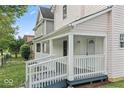 Charming house exterior with a front porch and ramp at 248 N Walcott N St, Indianapolis, IN 46201