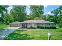 Brick ranch house with attached garage and large yard at 17128 Towne Rd, Westfield, IN 46074