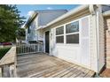 Wooden deck with railing, offering outdoor space adjacent to home entrance at 4178 Sycamore Ct, Franklin, IN 46131