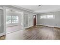 Bright living room with hardwood floors and fireplace at 3403 N College Ave, Indianapolis, IN 46205