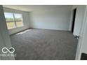 Bright and airy bedroom with plush gray carpeting at 140 Hobbs Dr, Whiteland, IN 46184