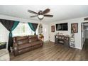 Relaxing living room with hardwood floors and fireplace at 941 N 500 W, Columbus, IN 47201