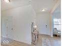 Open entryway with light walls and hardwood floors at 3923 Windstar Way, Columbus, IN 47203