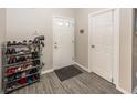 Clean entryway with storage and flooring at 4620 Whitham Ln, Indianapolis, IN 46237