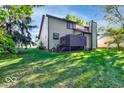 Private backyard with deck and grassy area at 7932 Eagle Valley Pass, Indianapolis, IN 46214