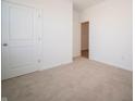 Simple bedroom with neutral carpeting and double door closet at 231 Lar Lan Dr, Danville, IN 46122