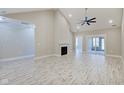 Spacious living room with hardwood floors, fireplace, and high ceilings at 2841 Grandview Ln, Greenwood, IN 46143