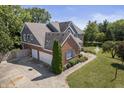 Beautiful home with attached garage and pond view at 9259 Oak Knoll Ln, Fishers, IN 46037