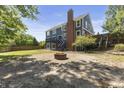 Spacious backyard with fire pit and patio area at 9259 Oak Knoll Ln, Fishers, IN 46037