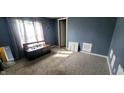 Small bedroom with gray walls, carpet, and a window at 9265 N Evans Rd, Monrovia, IN 46157
