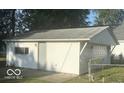 Detached single car garage with a paved driveway at 6733 S Cross St, Pendleton, IN 46064