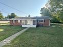 Brick ranch house with screen porch and a large backyard at 6733 S Cross St, Pendleton, IN 46064