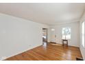 Bright living room with hardwood floors and large windows at 5648 N Keystone Ave, Indianapolis, IN 46220