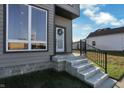Concrete steps leading to the front entrance of the house at 417 E Morris St, Indianapolis, IN 46225
