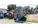 Modern three-story house with gray siding, showcasing curb appeal at 417 E Morris St, Indianapolis, IN 46225