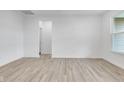 Bright living room featuring light gray vinyl flooring and an open floor plan at 2081 Covey Dr, Danville, IN 46122