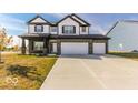Two story home, 3-car garage, brick exterior at 10257 Meadow Path Ln, Indianapolis, IN 46239