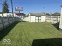 Backyard with shed and wooden fence at 905 Crescent Dr, Anderson, IN 46013