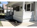 Renovated front porch with gray steps and white stonework at 3131 Boulevard Pl, Indianapolis, IN 46208