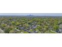 Aerial view of neighborhood with city skyline at 3006 N Olney St, Indianapolis, IN 46218
