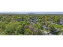 Aerial view of neighborhood with city skyline at 3006 N Olney St, Indianapolis, IN 46218