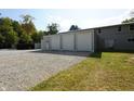 Three-car garage with additional covered parking at 5724 N Blazing Star Rd, Monrovia, IN 46157