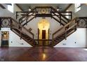 Unique wooden staircase with wagon wheel accents at 5724 N Blazing Star Rd, Monrovia, IN 46157