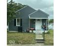 Gray house with a covered porch and small yard at 3410 Forest Ter, Anderson, IN 46013