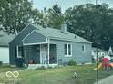 Gray house with a covered porch and small yard at 3410 Forest Ter, Anderson, IN 46013