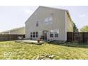 Large backyard with a wooden deck and grassy area at 2307 Blackthorn Dr, Franklin, IN 46131