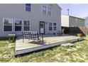 Spacious backyard with a wooden deck and seating at 2307 Blackthorn Dr, Franklin, IN 46131