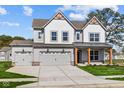 Two-story home with gray siding, white accents, and a three-car garage at 10620 Banyan Wood Ct, Indianapolis, IN 46239