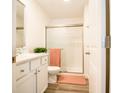 Clean bathroom with a walk-in shower and white vanity at 1431 Coen Ct, Columbus, IN 47201