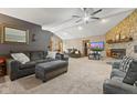 Spacious living room with stone fireplace and vaulted ceiling at 4525 S Deck Rd, Gosport, IN 47433