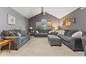 Living room with comfy sofas and neutral color palette at 4525 S Deck Rd, Gosport, IN 47433