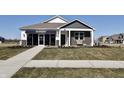 Model home exterior, showcasing front yard and walkway at 116 Carrick Glen Blvd, Pendleton, IN 46064