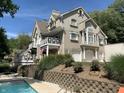 Two-story house with a brick facade, attached two-car garage, and a swimming pool at 10781 Cedar Ridge Ln, Brownsburg, IN 46278