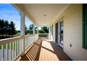Spacious porch with wooden deck and white railings at 4176 N 625 W, Bargersville, IN 46106