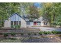 Two-story home with stone and wood siding at 8954 Briarclift Rd, Indianapolis, IN 46256