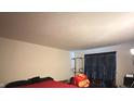 Bright bedroom with a large bed and window at 7625 Firecrest Ln, Camby, IN 46113