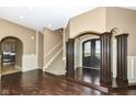 Grand entryway with hardwood floors, two-story ceilings and curved staircase at 10881 Harbor Bay Dr, Fishers, IN 46040