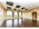 Spacious living room with hardwood floors, recessed lighting and high ceilings at 10881 Harbor Bay Dr, Fishers, IN 46040