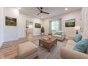 Living room with light beige furniture and hardwood floors at 1521 Indiana Ave, Columbus, IN 47201